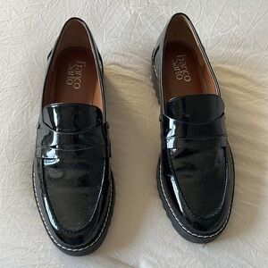 Black patent leather loafer shoes